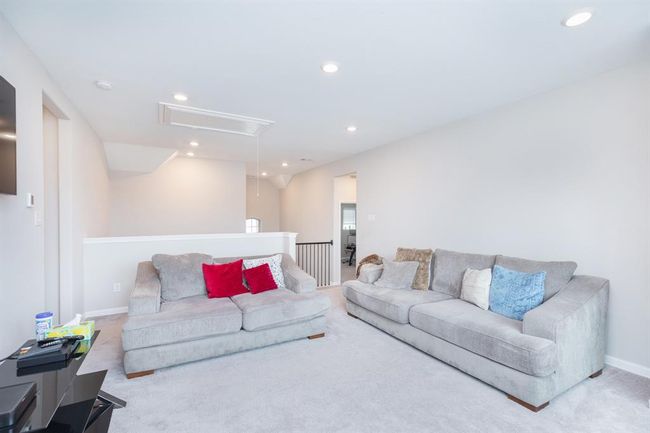 spacious 2nd living area with recessed lighting creating a welcoming space for relaxation or entertainment. | Image 27