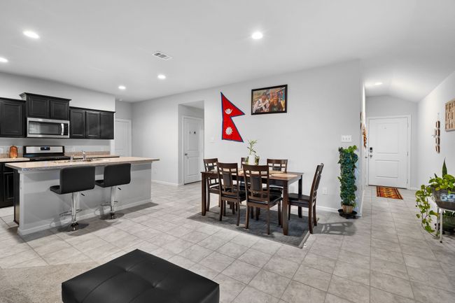 Dining area with baseboards, visible vents, and recessed lighting | Image 5
