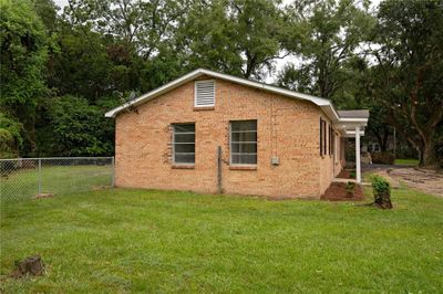 View of side of home featuring a lawn | Image 3