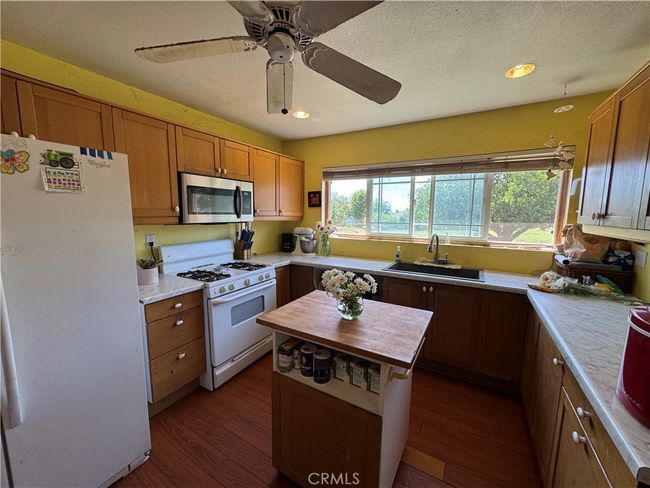 Lots of Cabinets in Kitchen | Image 24