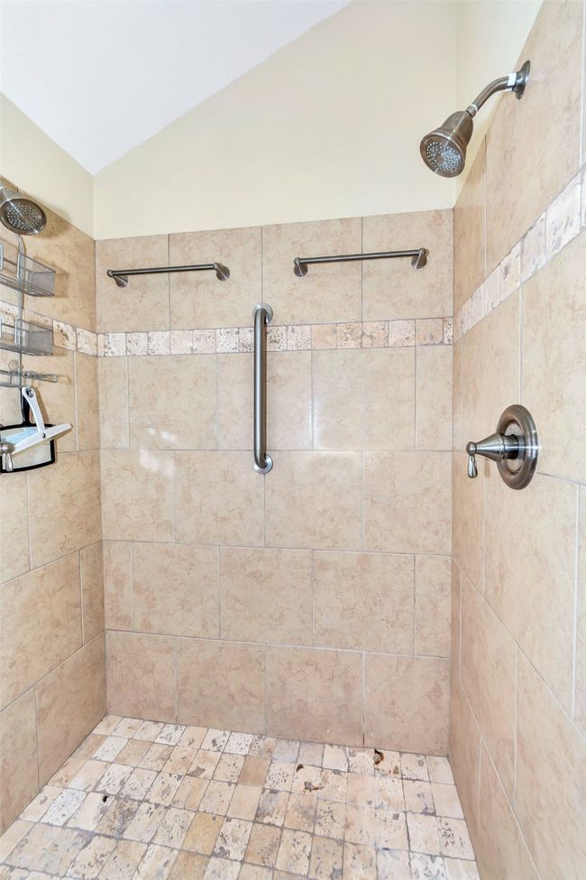Bathroom featuring tiled shower | Image 23