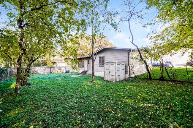 Fenced backyard featuring entry steps | Image 26