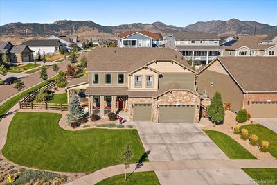 8733 Crestone Street, House other with 5 bedrooms, 4 bathrooms and 3 parking in Arvada CO | Image 3