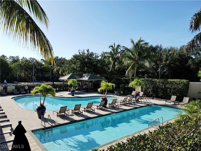View of pool with a patio | Image 31
