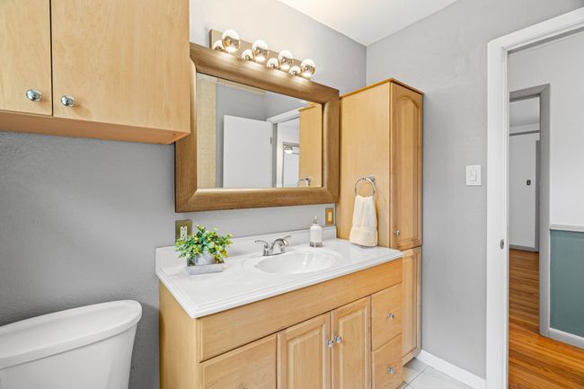 Bathroom featuring vanity and wood finished floors | Image 23