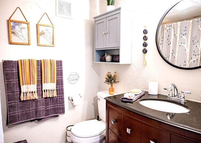 Bathroom featuring visible vents, toilet, vanity, and a shower with curtain | Image 13