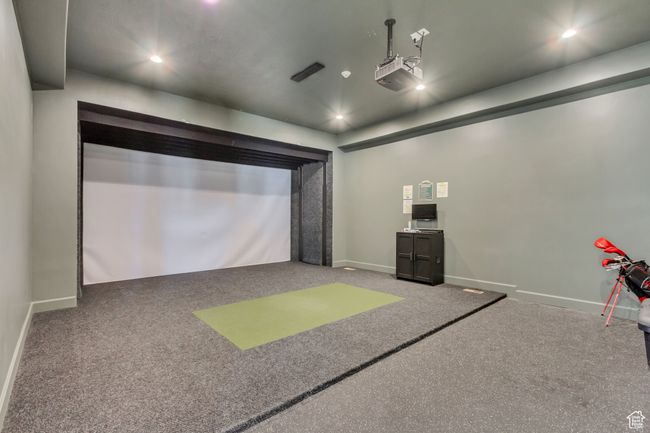 Rec room featuring recessed lighting, golf simulator, baseboards, and carpet | Image 33