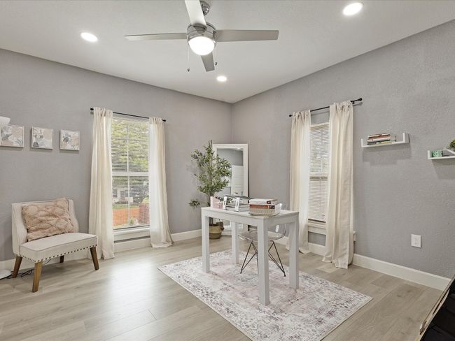Office area with a ceiling fan, light wood-type flooring, recessed lighting, and baseboards | Image 23