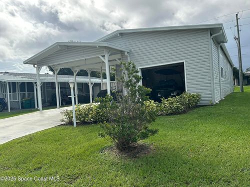 919 Vireo Dr, Barefoot Bay, FL, 32976-7350 | Card Image