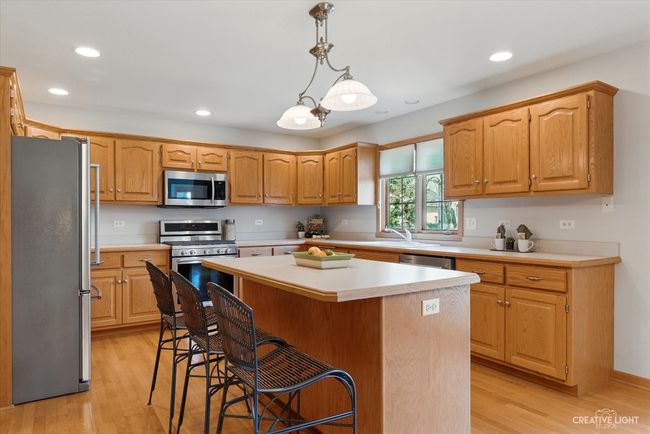 406 Camden Cir, House other with 4 bedrooms, 4 bathrooms and 3 parking in Oswego IL | Image 6