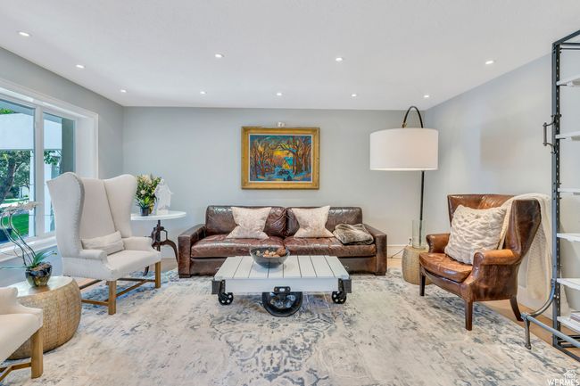 Living room, or it could possibly be a dining area | Image 25