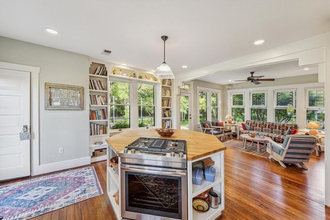 Kitchen Island overlooking the main living area. | Image 7