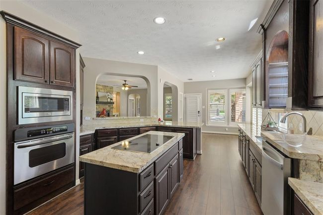 Induction cooktop in island. There is a gas connection if you prefer to a gas cooktop. | Image 18