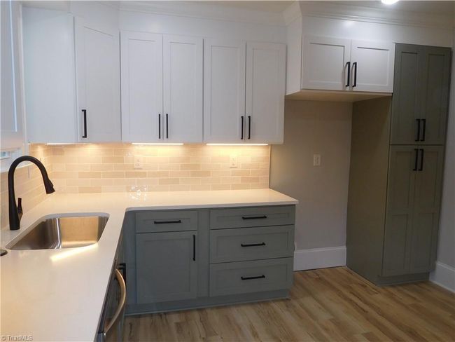 BUILT-IN PANTRY FOR ADDITIONAL STORAGE. | Image 10
