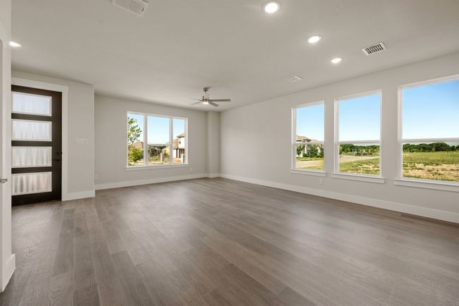 Light, bright and airy, this new family room is everything you have been searching for! | Image 6
