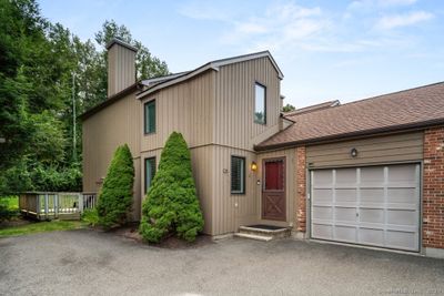 Coveted End Unit with Attached Garage Access. | Image 1