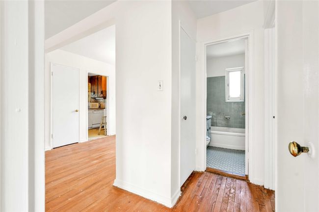 Corridor featuring light wood-type flooring | Image 9