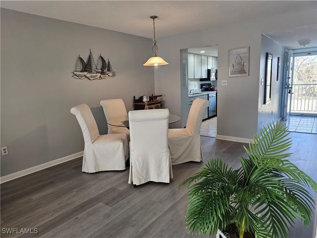 Dining/ Living area updated with luxury vinyl plank wood-style floors | Image 20