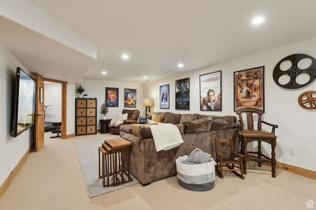 Living room featuring carpet floors, recessed lighting, and baseboards | Image 50