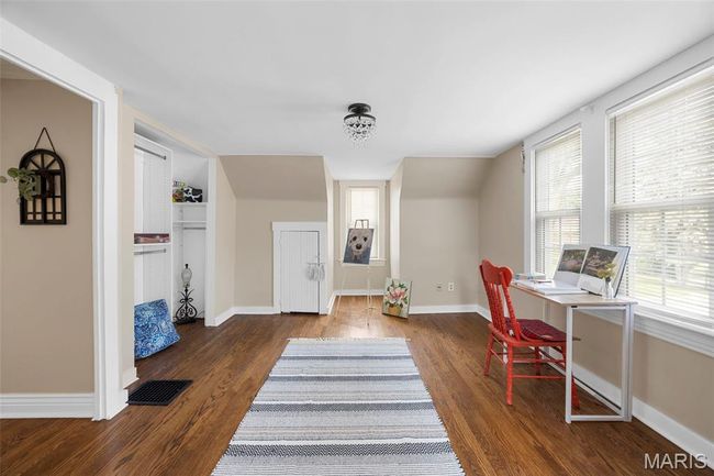 Office space with wood finished floors and plenty of natural light | Image 22
