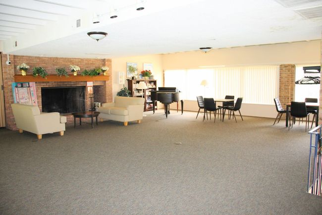 Fireplace and piano in upstairs gathering room | Image 31