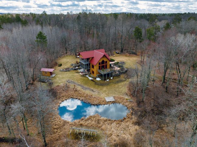 The main cabin site is very private with 4 kilowatt panel to take advantage of the cleared area. | Image 4