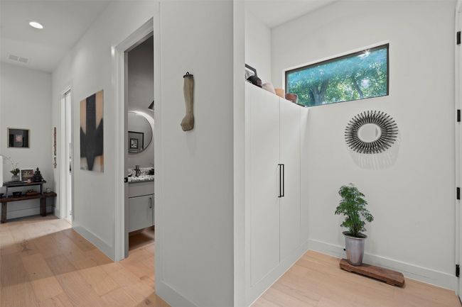 Hall featuring light wood-style floors and recessed lighting | Image 20