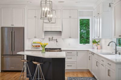 Check out this amazing chef's kitchen with high end cabinetry, new windows, stainless steel appliances, pot filler and Quartz countertops! | Image 3