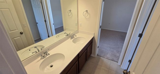 2nd Bathroom with double vanity and baseboards | Image 27