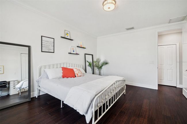 Spacious 3rd floor bedroom with water view. | Image 69