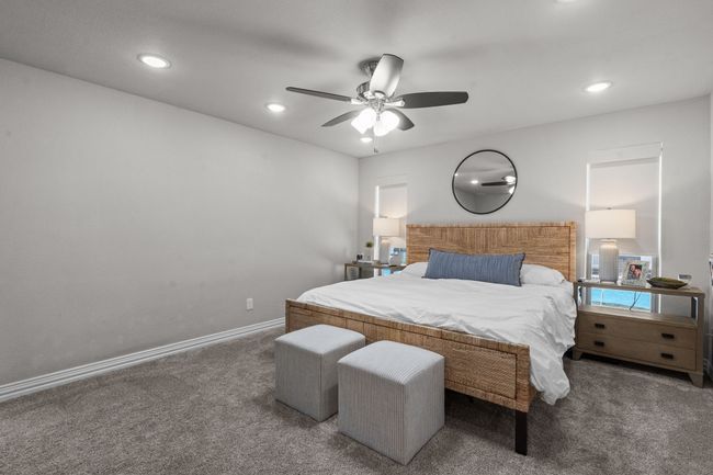 Bedroom with carpet flooring, recessed lighting, ceiling fan | Image 18