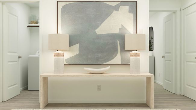 Detailed view of wood finished floors and washer / dryer | Image 19