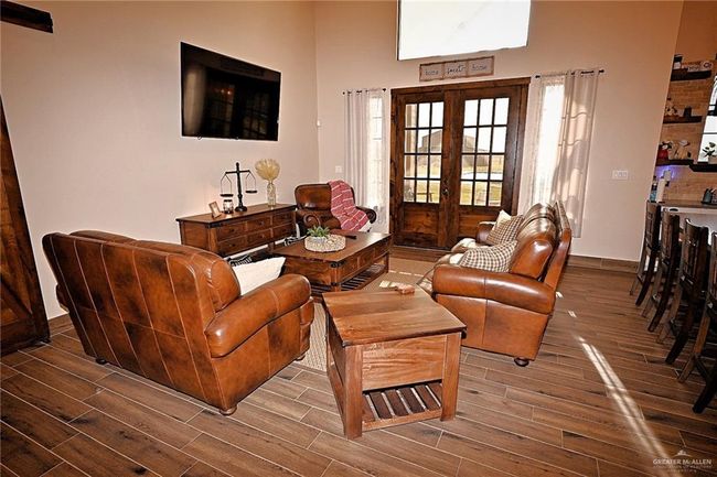 Living room featuring french doors and dark hardwood / wood-style floors | Image 9