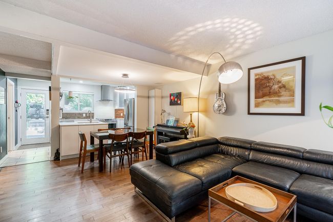 Living area with light wood-style flooring | Image 6