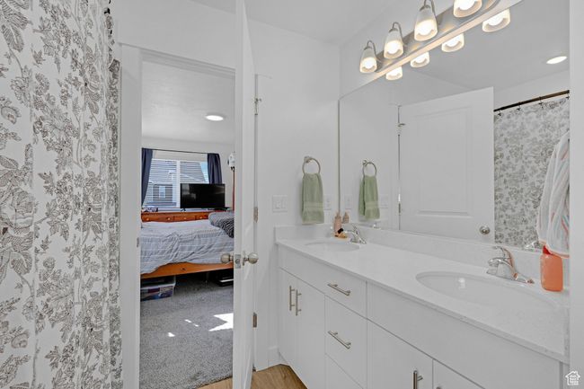 Ensuite bathroom featuring double vanity | Image 14