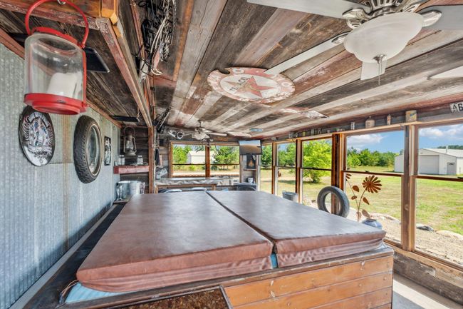 Relaxing off garage Sunroom | Image 56