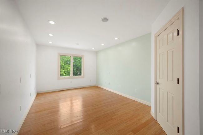 Unfurnished room featuring light wood-style floors and recessed lighting | Image 29