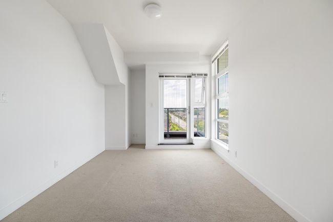 Carpeted empty room with baseboards | Image 16
