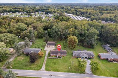 2654 & 2658 Sweitzer Road, Home with 4 bedrooms, 2 bathrooms and null parking in Uniontown OH | Image 3