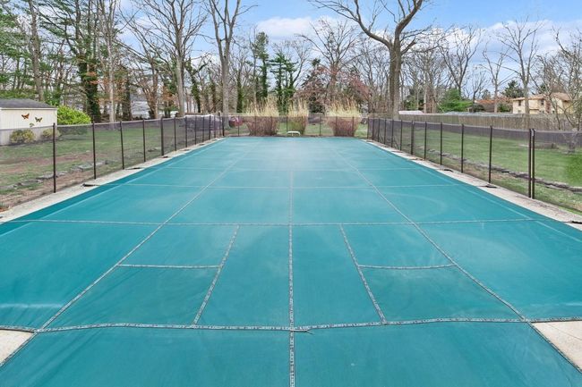 In-ground pool with fencing | Image 33