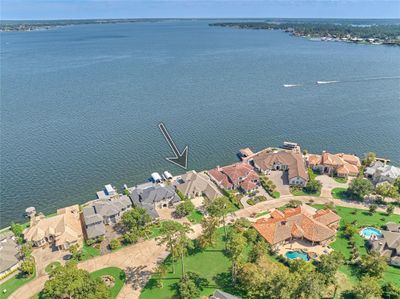 Discover unparalleled serenity with this home's expansive 7-mile vista over open waters! | Image 3