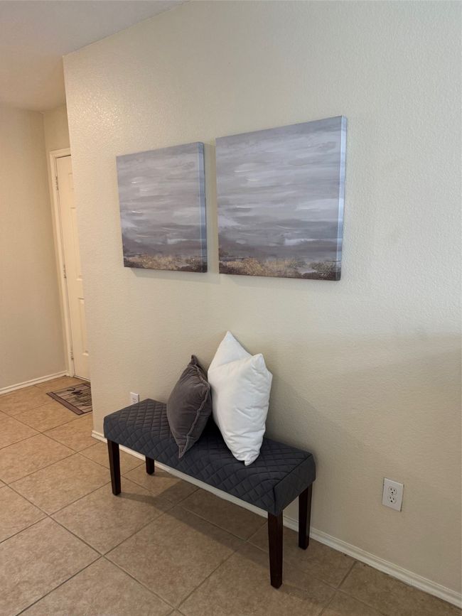 Sitting room with tile patterned flooring and baseboards | Image 6