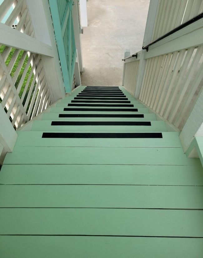 There is a 2nd layer of security in a locking door/gate on this great interior stairwell protected from the weather. | Image 34