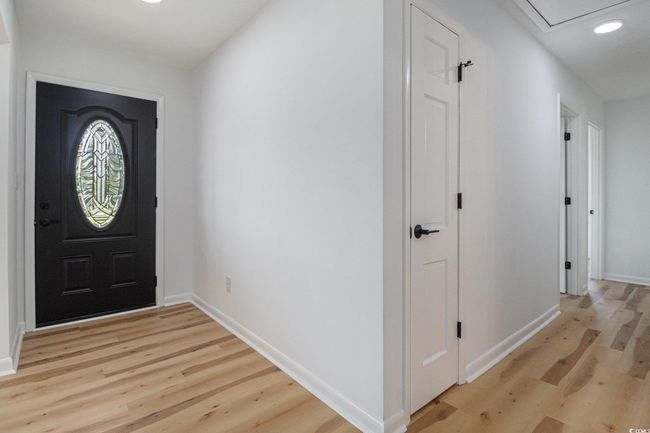 Near the front foyer entrance you will see a closet conveniently located for jackets and coats. Further down the hall way there is a linen closet centrally located for use. | Image 18