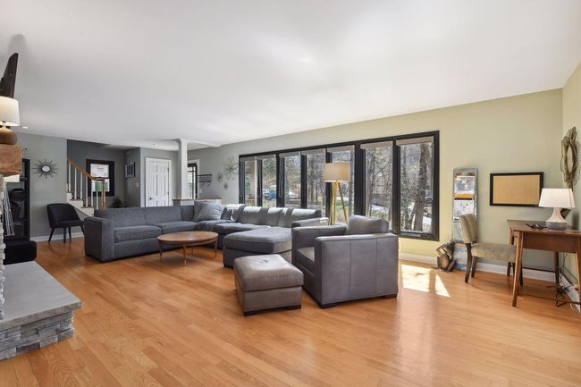 Open and bright living space with views of the front yard | Image 7