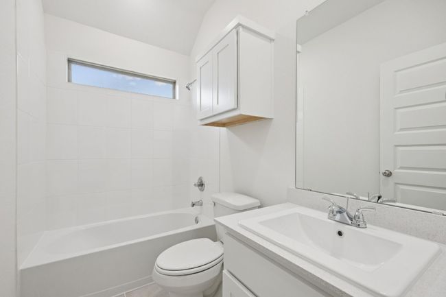 Full bathroom with vanity and shower / bath combination | Image 31