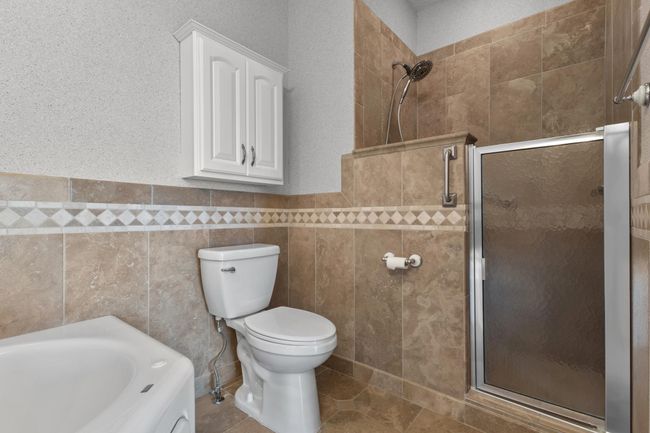 Large walk-in shower. | Image 12