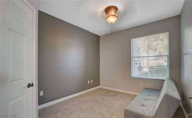 Unfurnished room with a ceiling fan, carpet floors, and baseboards | Image 15