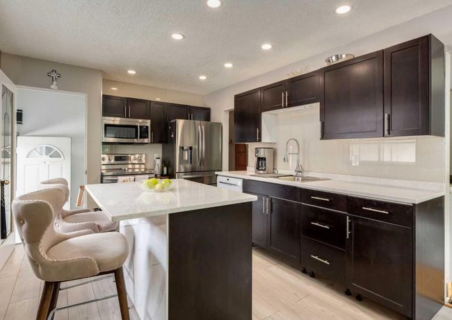 1040 16 Street Ne, House other with 5 bedrooms, 2 bathrooms and 3 parking in Calgary AB | Image 8