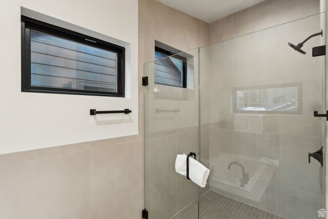 Bathroom featuring tile patterned floors and walk in shower | Image 21